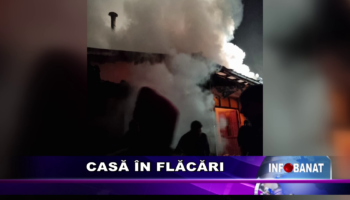 Casă în flăcări