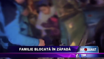 Familie blocată în zăpadă