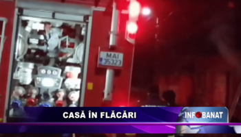 Casă în flăcări