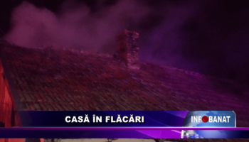 Casă în flăcări
