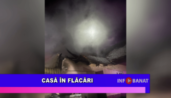 Casă în flăcări