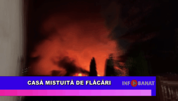 Casă mistuită de flăcări