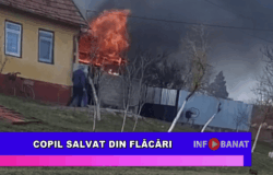 Copil salvat din flăcări