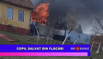 Copil salvat din flăcări