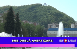 Sub dublă avertizare