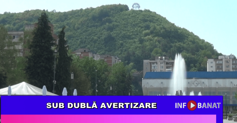 Sub dublă avertizare