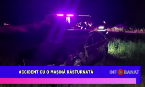 Accident cu o mașină răsturnată