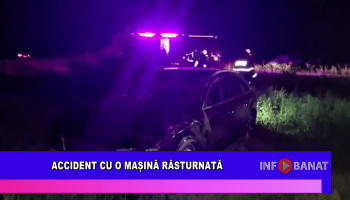 Accident cu o mașină răsturnată