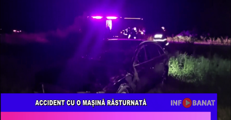 Accident cu o mașină răsturnată