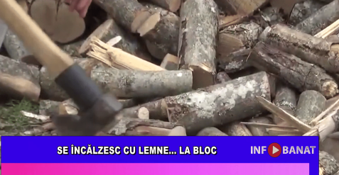 Se încălzesc cu lemne…   la bloc